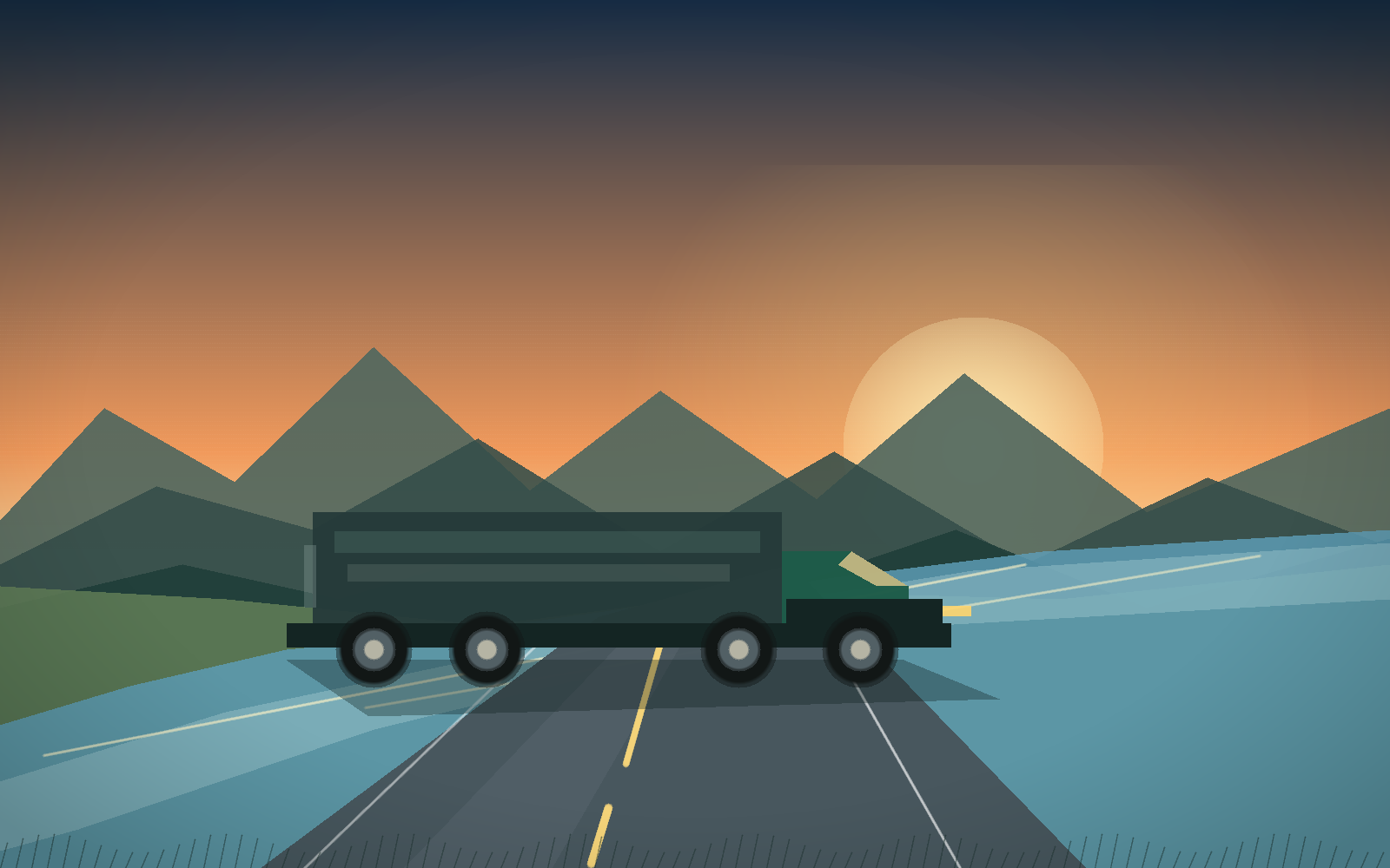 Camion con semirimorchio in una valle al tramonto, vicino a un fiume